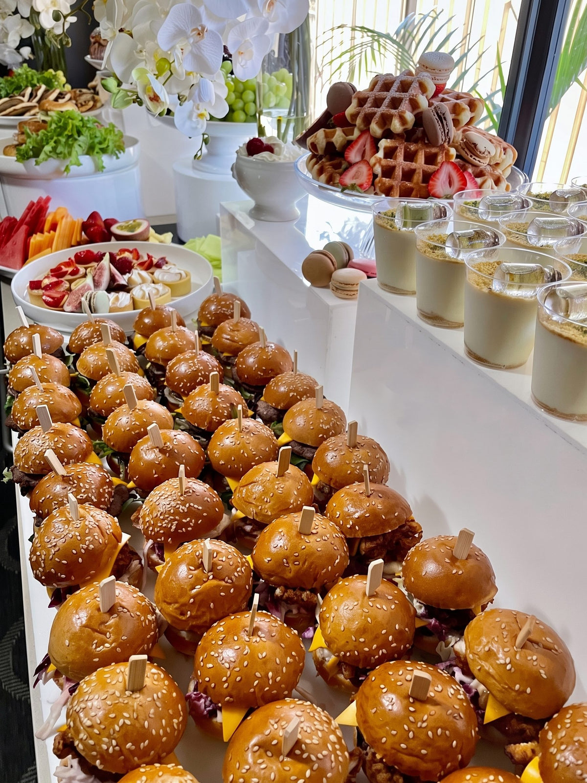 Sliders and waffles set out along a styled table